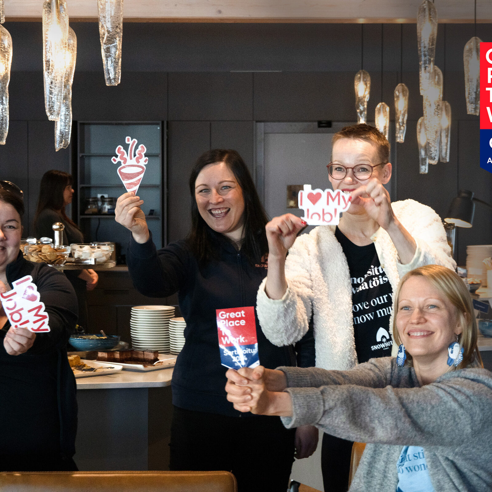 Snowhotel Family members celebrating ranking in Great place to work listing