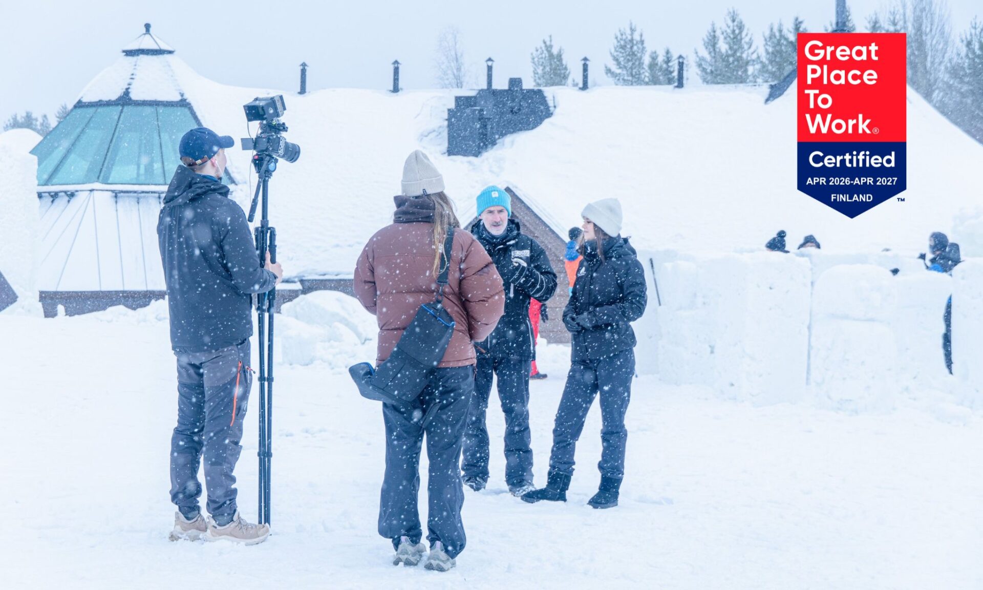 Snowhotel Family team members outdoors in a winter setting during a filming day at Lehtojärvi.