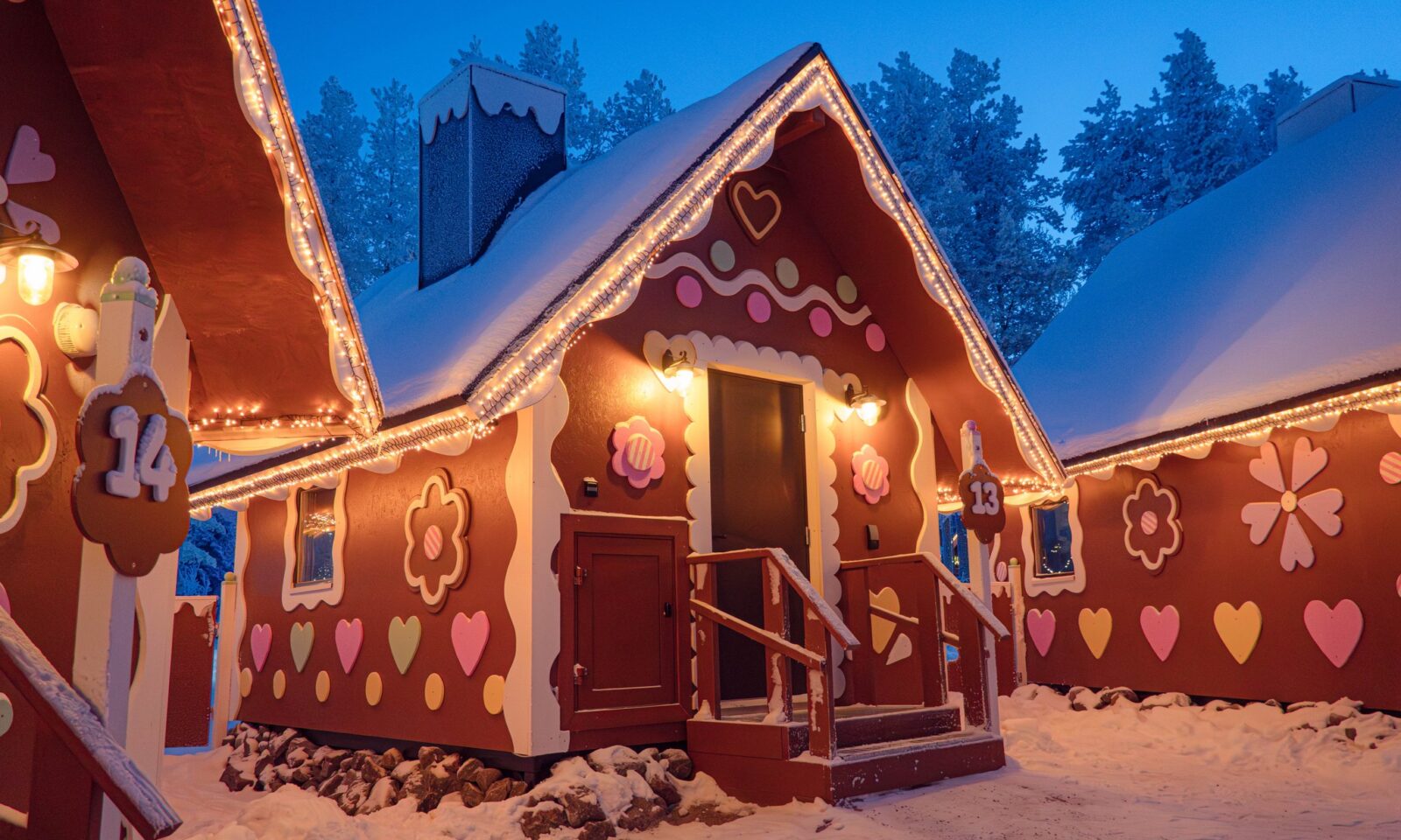 A small gingerbread cabin in winter at Piparina Day Cabins & Dining.